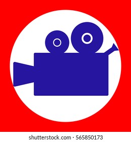 Video camera sign. Blue icon in white circle at red background. Colors of USA flag. Circumscribed circle. Circumcircle.