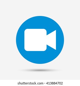 Video camera sign icon. Video content button. Blue circle button with icon. Vector