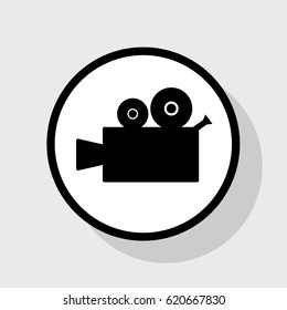 Video camera sign. Vector. Flat black icon in white circle with shadow at gray background.
