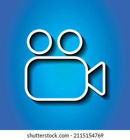 Video camera simple icon. Flat desing. White icon with shadow on blue background.ai