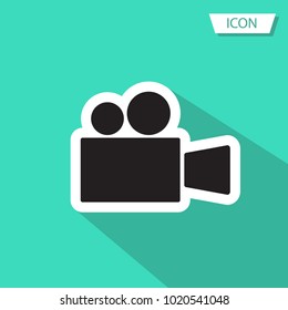 video camera vector icon on green background.