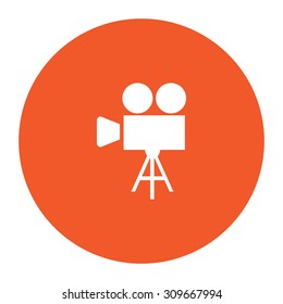 Video film camera. Flat white symbol in the orange circle. Vector illustration icon