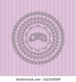 video game icon inside badge with pink background