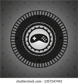 video game icon inside black badge