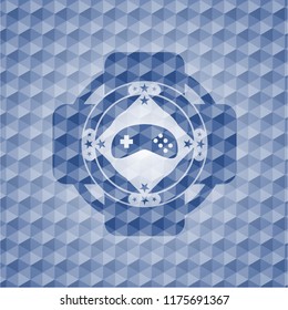 video game icon inside blue emblem with geometric pattern.