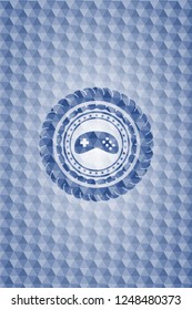 video game icon inside blue hexagon badge.