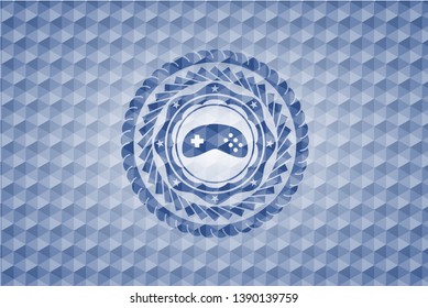 video game icon inside blue hexagon badge.