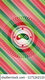 video game icon inside christmas colors style badge.