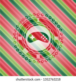 video game icon inside christmas emblem background.