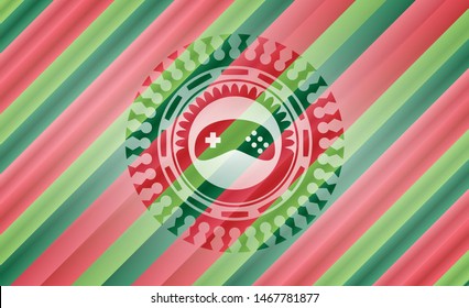video game icon inside christmas colors badge.