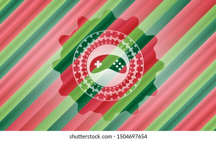 video game icon inside christmas colors style badge.