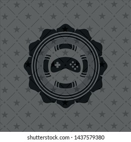 video game icon inside dark badge