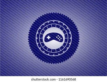 video game icon inside emblem with jean texture