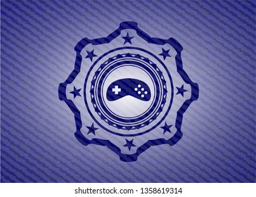 video game icon inside emblem with jean texture