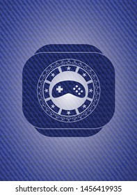 video game icon inside emblem with jean texture