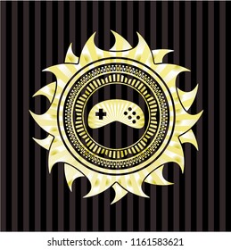 video game icon inside gold emblem