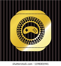 video game icon inside gold emblem or badge