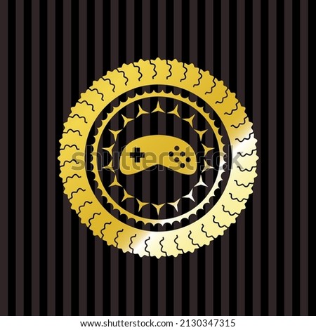 video game icon inside gold badge or emblem. 