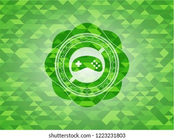 video game icon inside green emblem with mosaic ecological style background