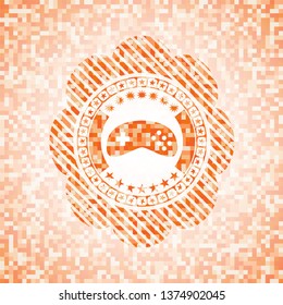 video game icon inside orange mosaic emblem