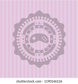 video game icon inside pink emblem