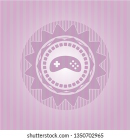 video game icon inside pink emblem