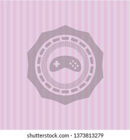 video game icon inside pink emblem