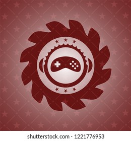 video game icon inside realistic red emblem