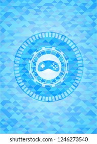 video game icon inside realistic light blue mosaic emblem
