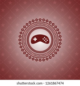 video game icon inside realistic red emblem
