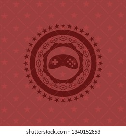 video game icon inside realistic red emblem