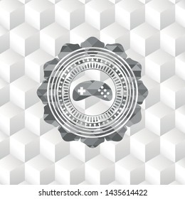video game icon inside realistic grey emblem with geometric cube white background