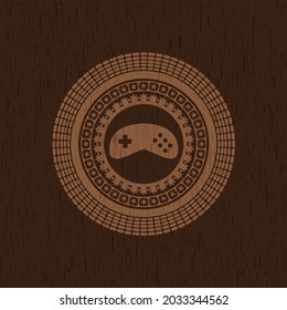 video game icon inside realistic wood emblem. 