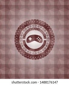 video game icon inside red seamless geometric badge.