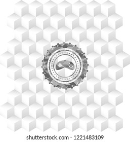 video game icon inside retro style grey emblem with geometric cube white background