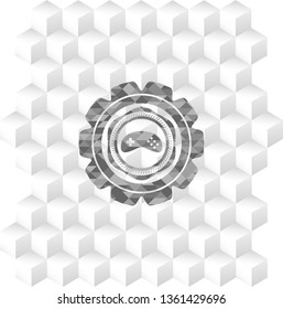video game icon inside retro style grey emblem with geometric cube white background