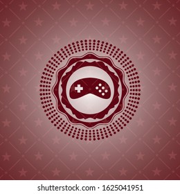 video game icon inside retro red emblem