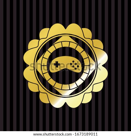 video game icon inside shiny emblem