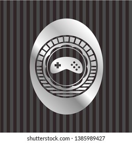 video game icon inside silvery badge