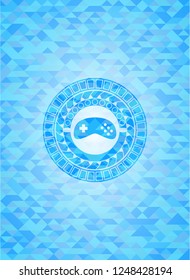 video game icon inside sky blue emblem with mosaic background