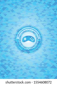 video game icon inside sky blue emblem. Mosaic background