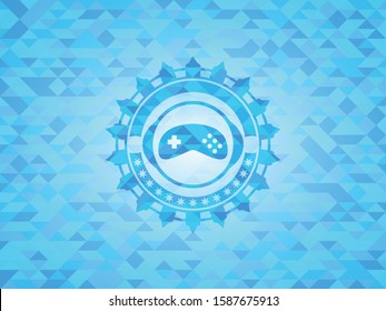 video game icon inside sky blue mosaic emblem