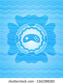 video game icon inside water wave concept badge.