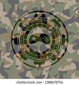 video game icon on camouflage texture
