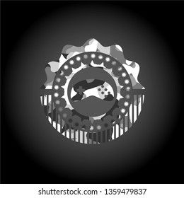 video game icon on grey camouflage texture