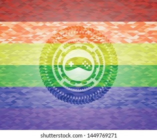video game icon on mosaic background with the colors of the LGBT flag