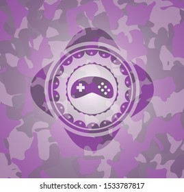 video game icon on pink and purple camo pattern
