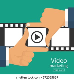 Video marketing concept. Video filming isolated. Movie time. Presentation advertise, blogging, streaming, television, share content. Coming soon. Hand frame on filmstrip background. Vector flat design