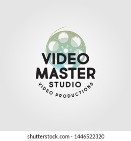 Video Master logo. Video Production Studio emblem. Symbol of cine-film with letters. Scratches, shabby style.