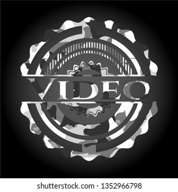 Video on grey camouflaged texture